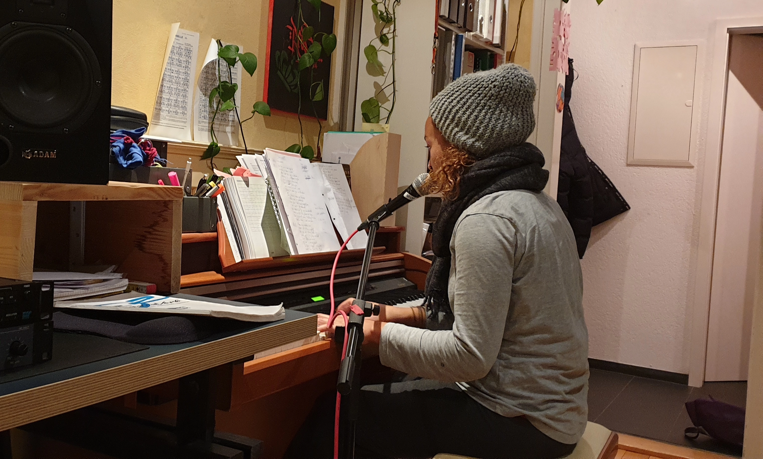 One song changed everything. Olivia playing piano and singing in her studio while working on [Ich Ziehe Los](/music/ich-ziehe-los) — the song that helped start Rolla Tunes.